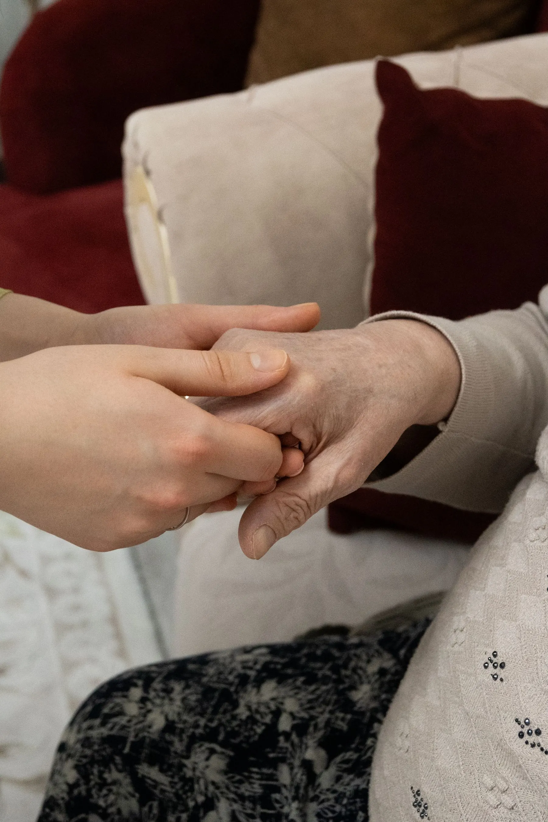 Intergenerational hands expressing support, protection and continuity